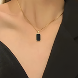 Gold Necklace with Black Rectangular Pendant