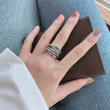 Adjustable Silver Tone Multi Band Ring with Layered Detailing