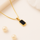 Gold Necklace with Black Rectangular Pendant