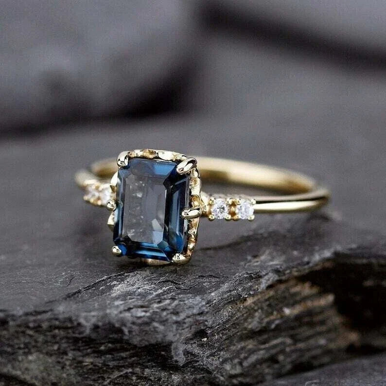 Gold-Plated Ring with Deep Blue Rectangular Stone Accent