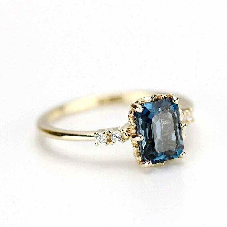 Gold-Plated Ring with Deep Blue Rectangular Stone Accent