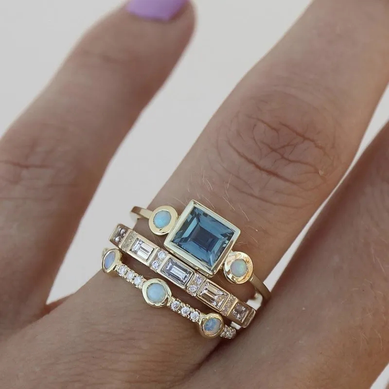 Gold-Plated Ring Stack with Blue and Clear Crystals