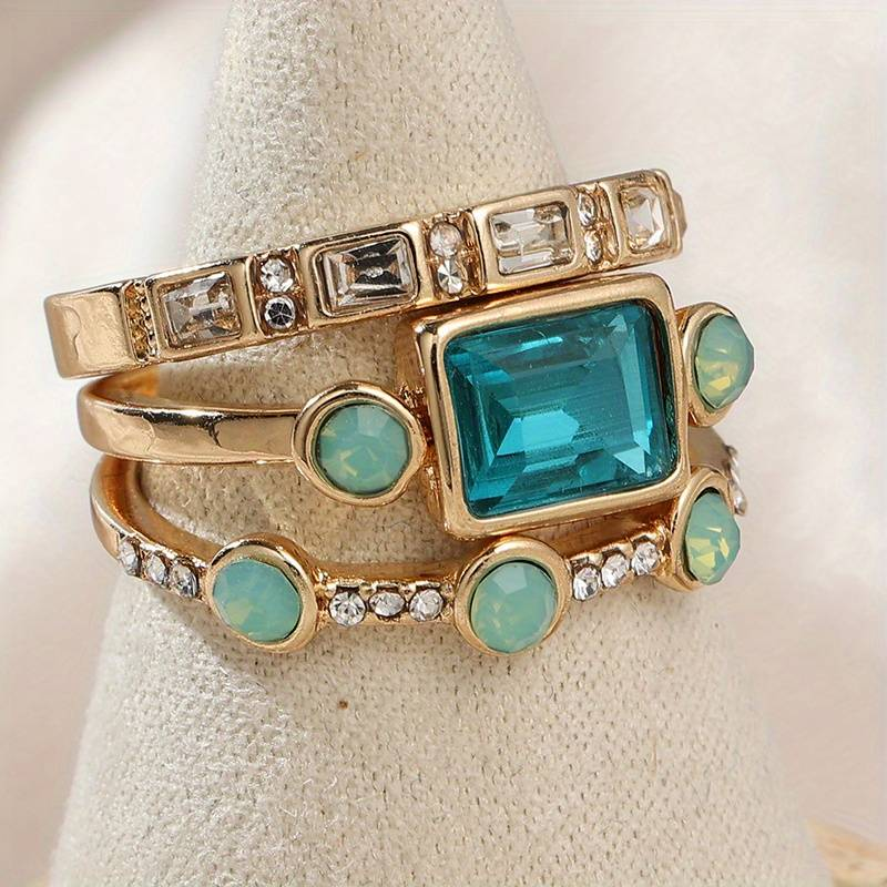 Gold-Plated Ring Stack with Blue and Clear Crystals