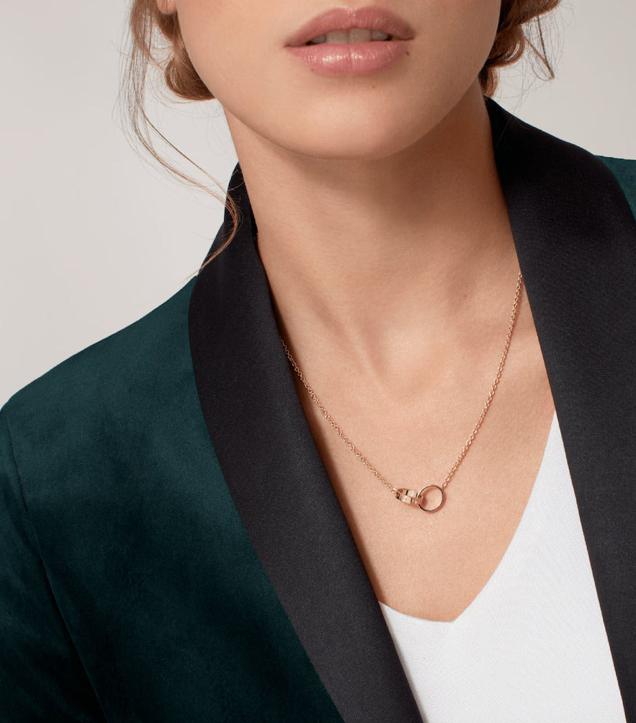 Gold-Tone Necklace with Interlocking Ring Pendants