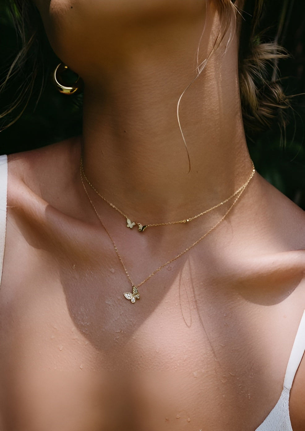 Gold-Toned Necklace with Crystal-Studded Butterfly Pendant