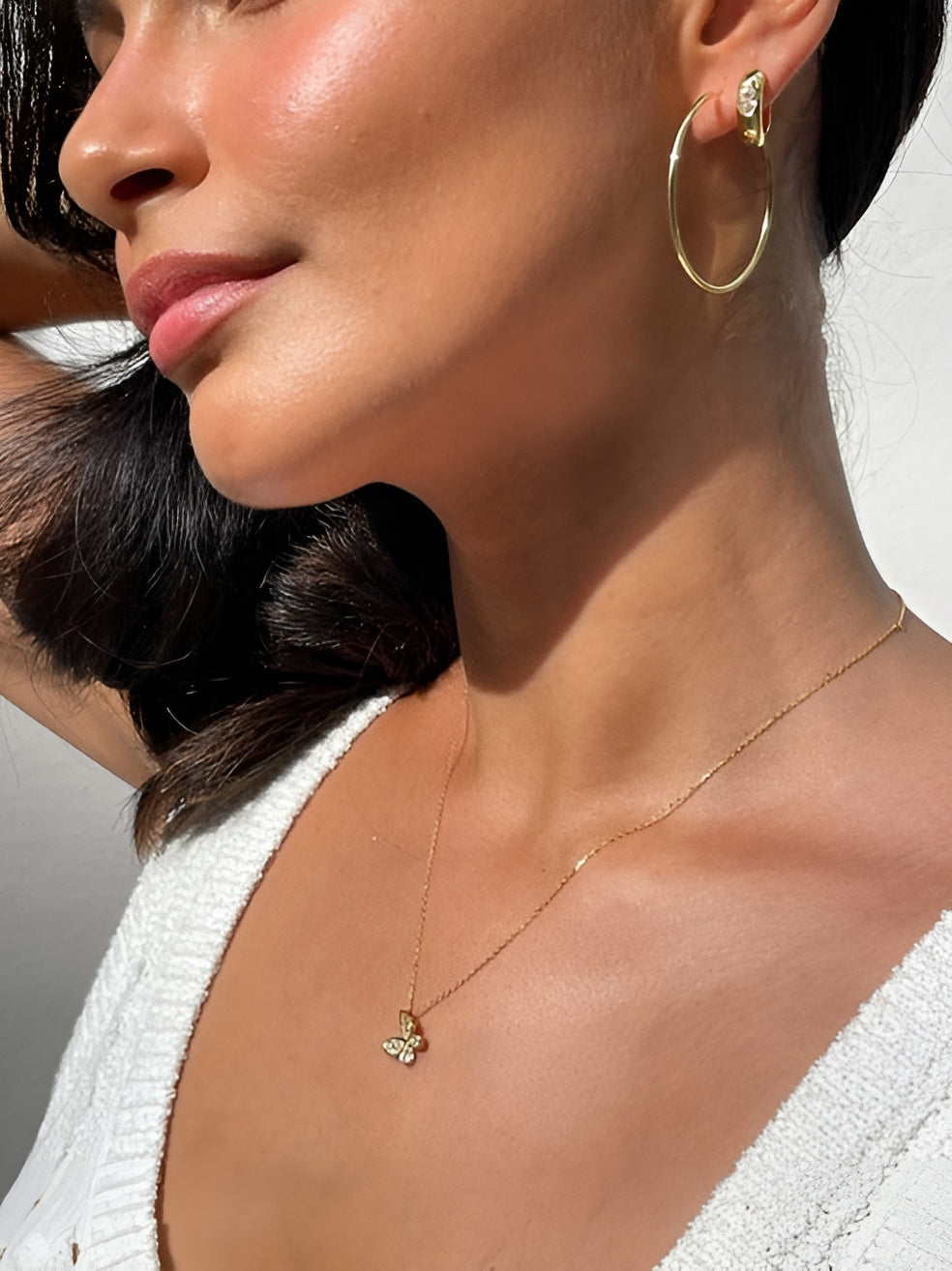 Gold-Toned Necklace with Crystal-Studded Butterfly Pendant