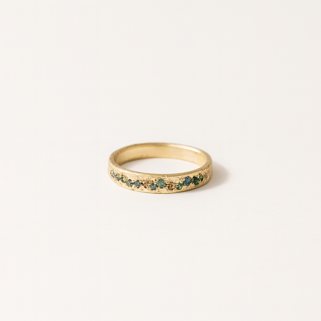 Gold Band Ring with Mixed Blue and Green Gem Accents