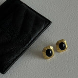 Gold Stud Earrings with Black Oval Center and Geometric Frame