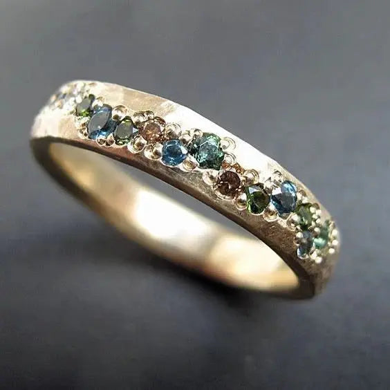 Gold Band Ring with Mixed Blue and Green Gem Accents