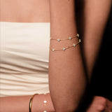 Gold Tone Bracelet with Delicate Flower Gemstones