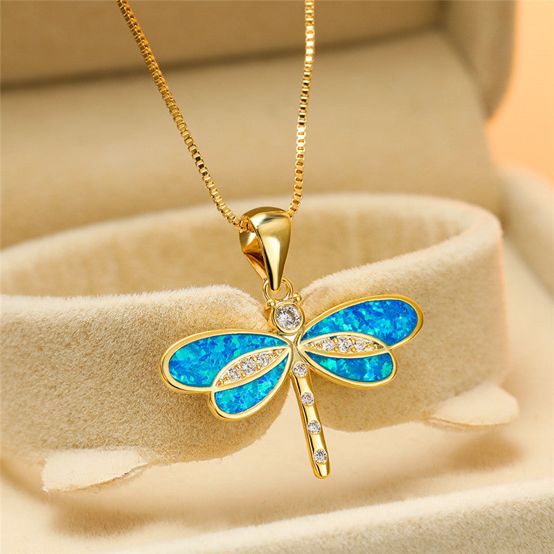 Gold Dragonfly Pendant Necklace with Blue and White Wing Accents