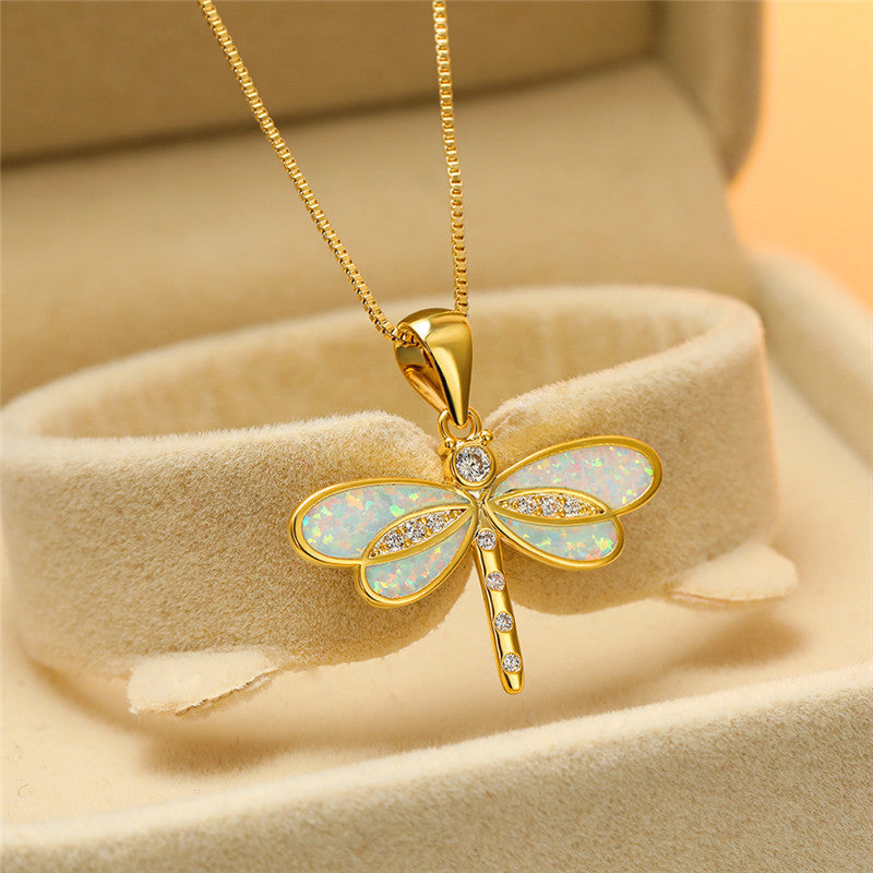 Gold Dragonfly Pendant Necklace with Blue and White Wing Accents