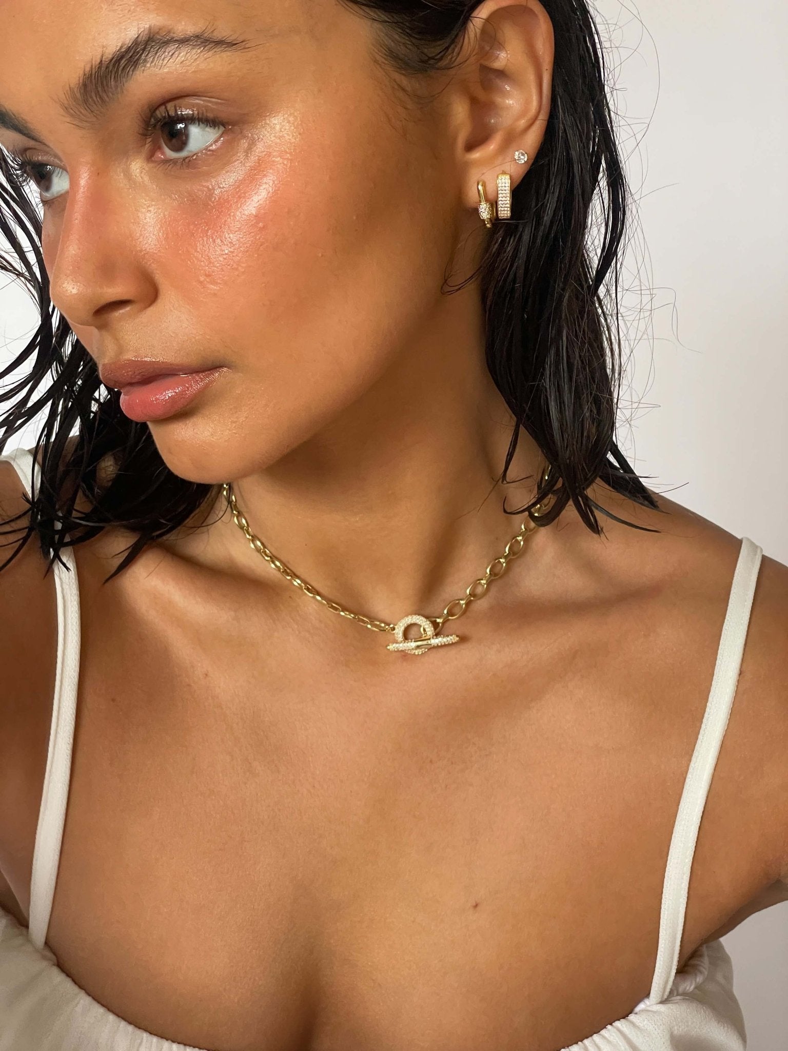 Gold Huggie Earrings with Sparkling Detail Rectangular Hoop