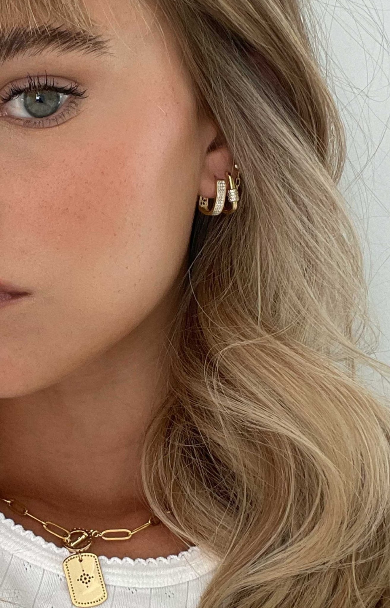 Gold Huggie Earrings with Sparkling Detail Rectangular Hoop