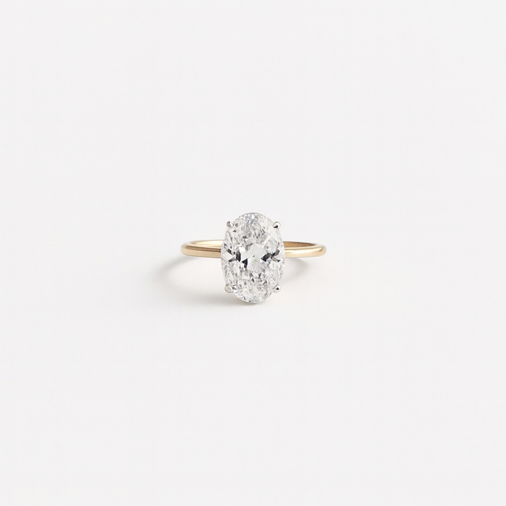 Gold Ring with Oval-Cut Center Stone