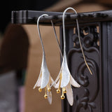 Long Silver Floral Drop Earrings with Gold Bead Accents