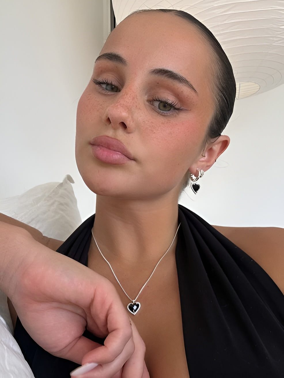 Silver Heart Pendant Necklace with Black Center Stone design