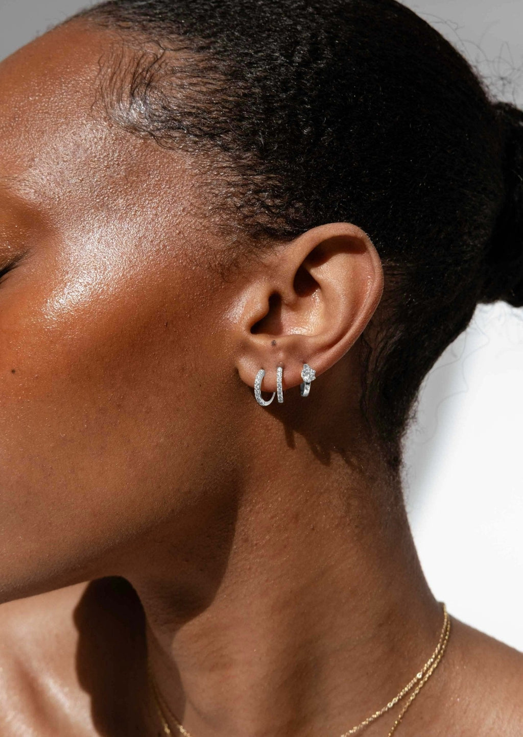 Silver Huggie Earrings with Solitaire-Style Zirconia design