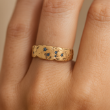 Textured Gold Tone Ring with Blue Crystal Accents
