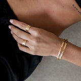 Gold Tone Band Ring with Embossed Heart Motif