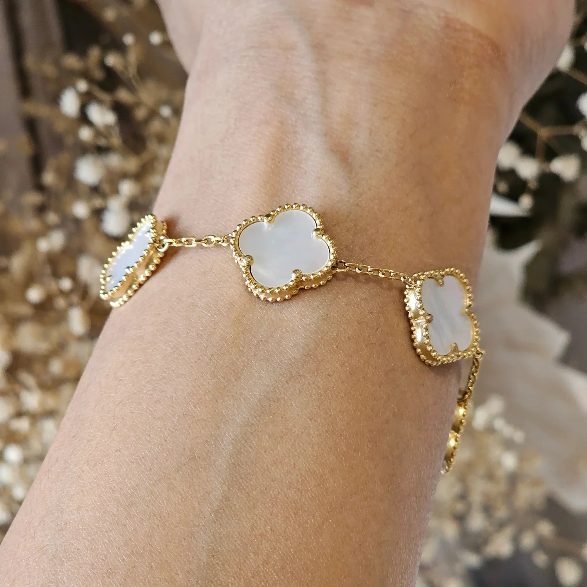 Gold Chain Bracelet with Black Clover-Shaped Charms