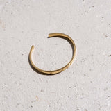 Gold Tone Bangle Bracelet with Star Detailing
